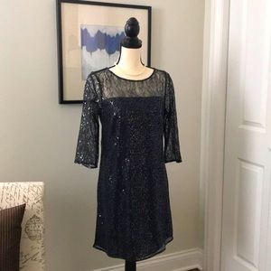 Black cocktail dress with all over sequins